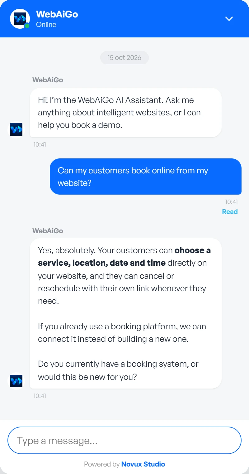 The real WebAiGo AI Assistant answering a visitor who asks about online booking.
